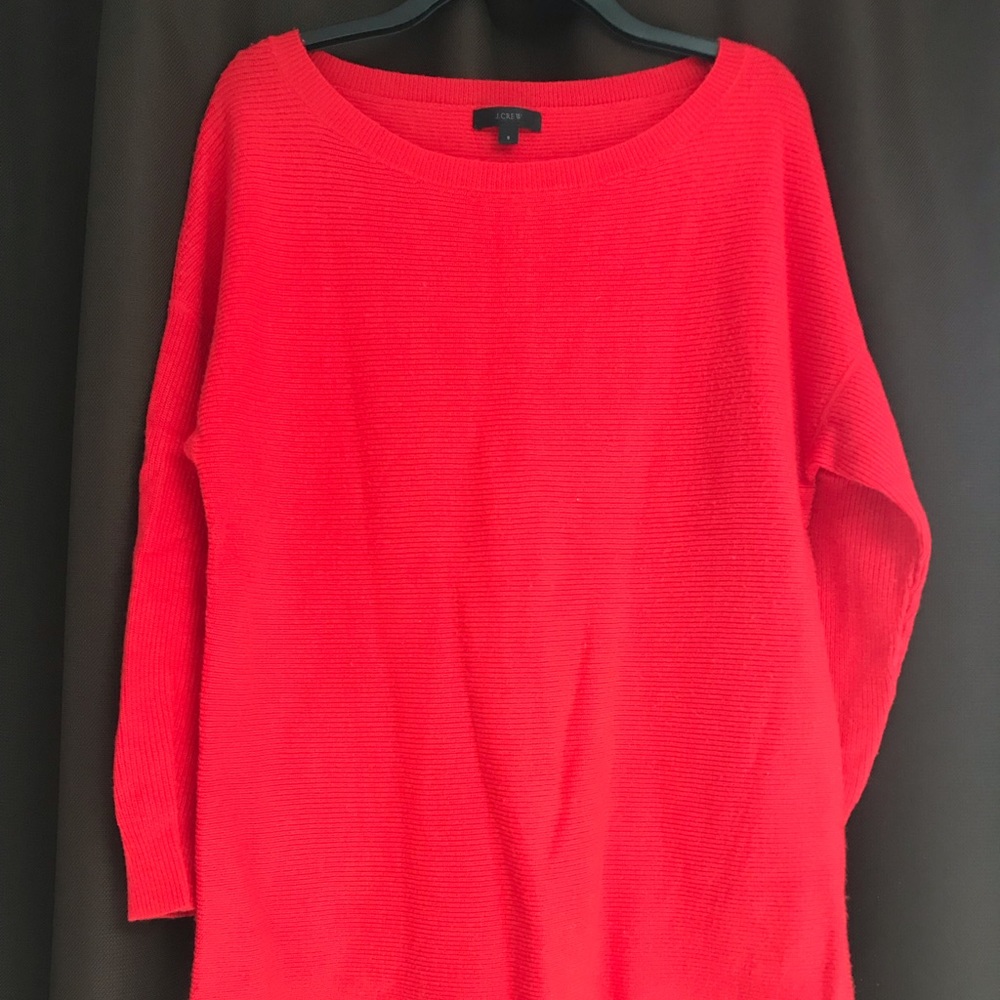 Bright red sweater